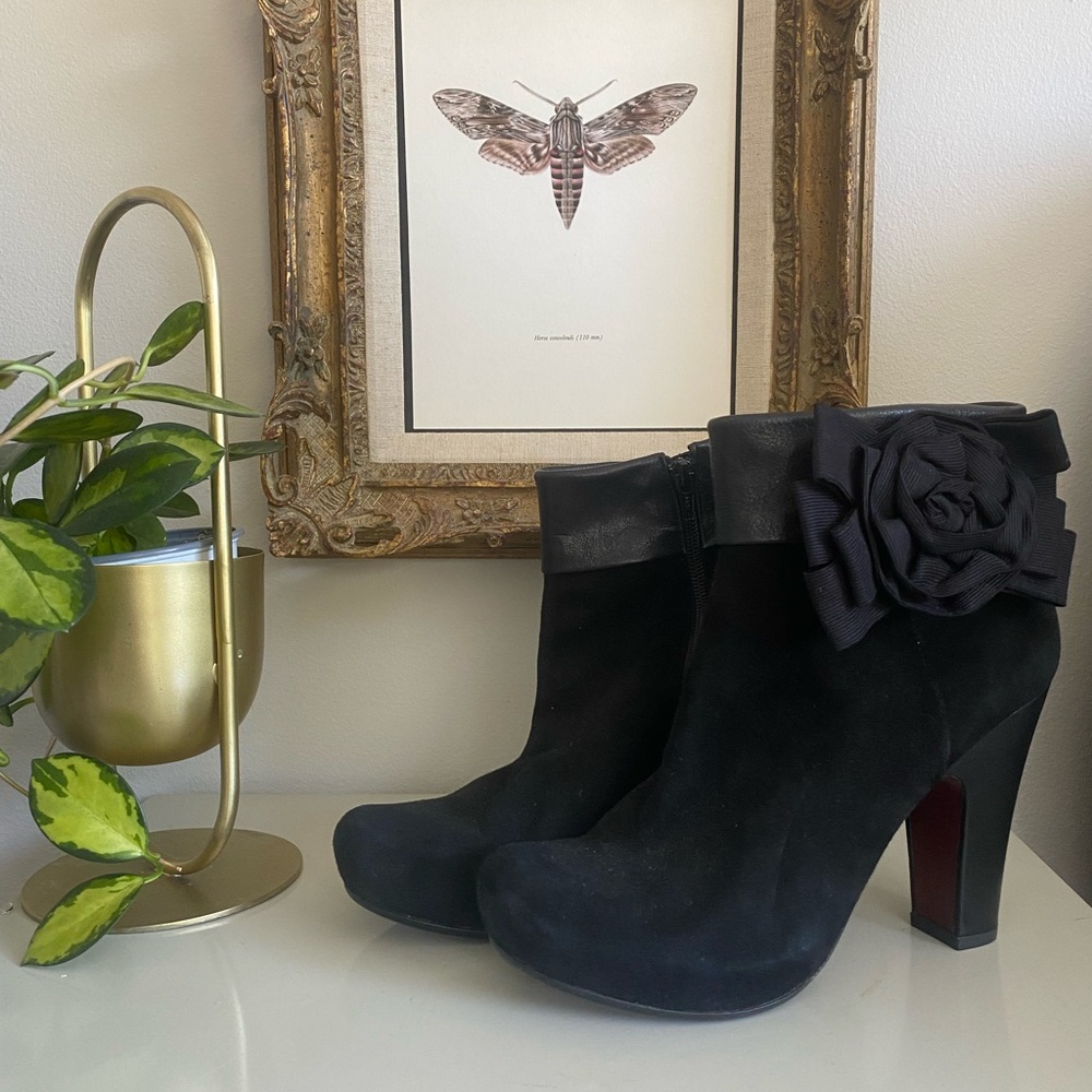 Chie Mihara Black Heeled Boots with Floral Accent